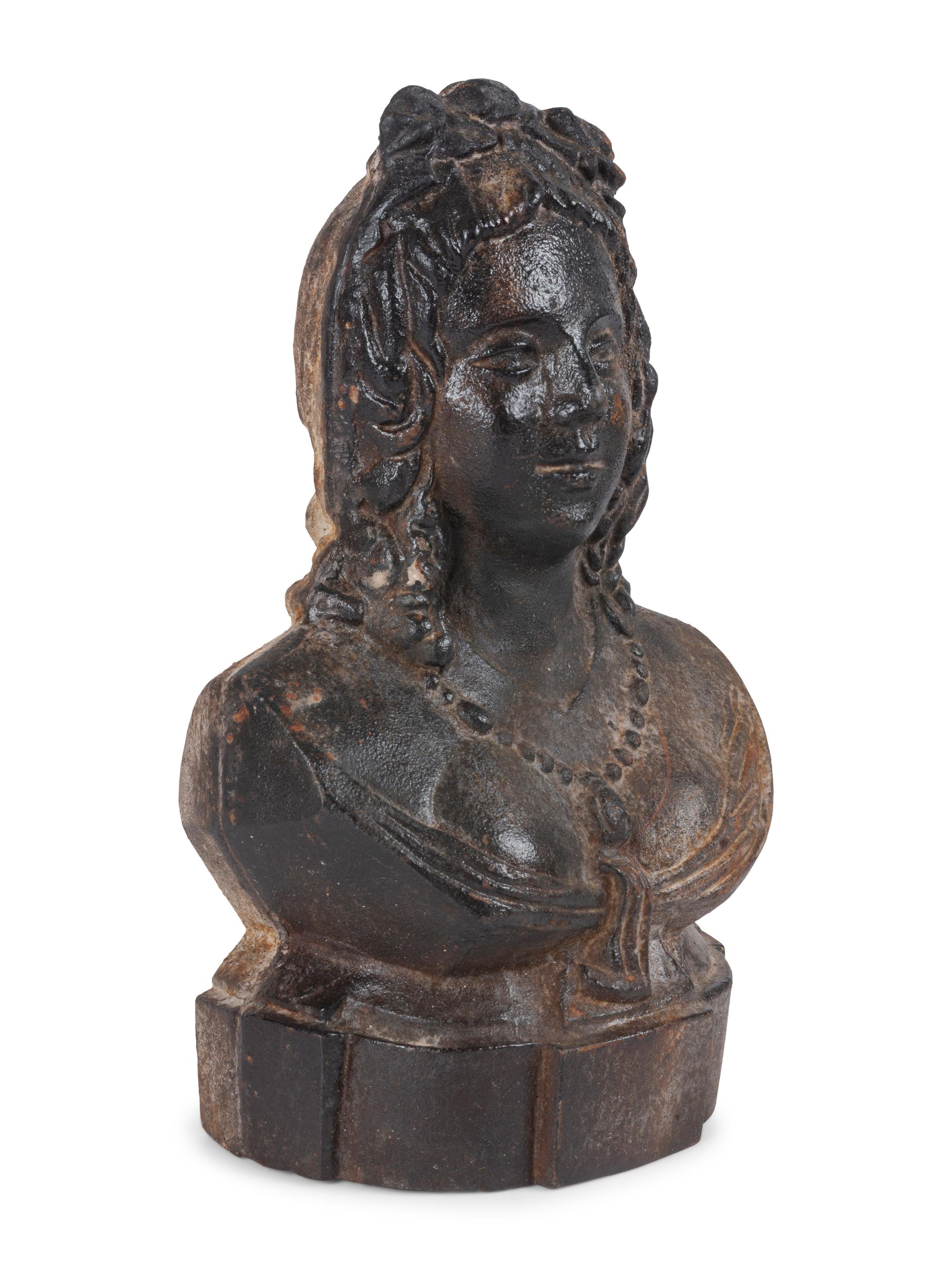 A Cast Iron Maiden-Form Door Stop