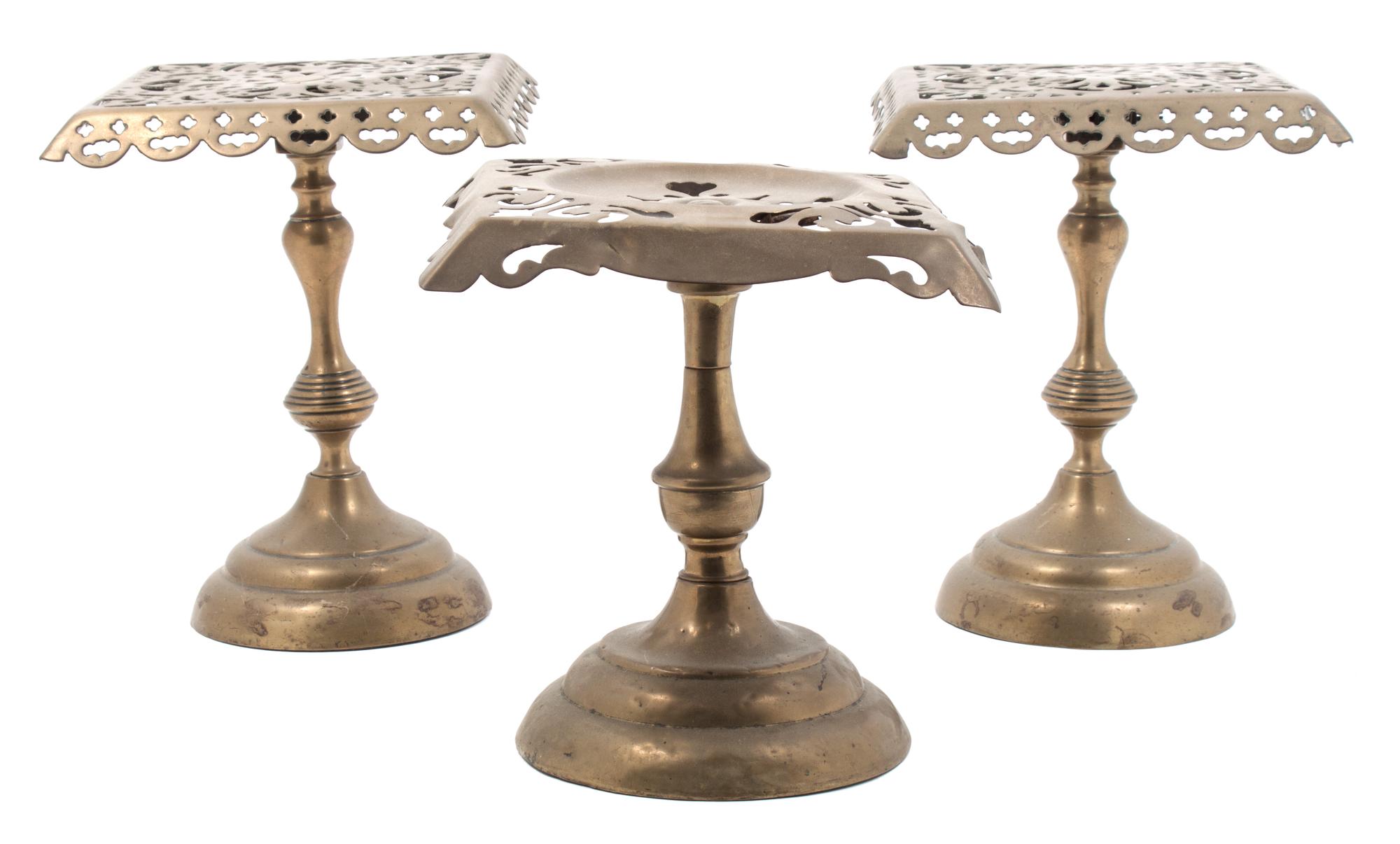 A Group of Three Brass Trivets Height of first 8 inches. — LATE 19TH CENTURY