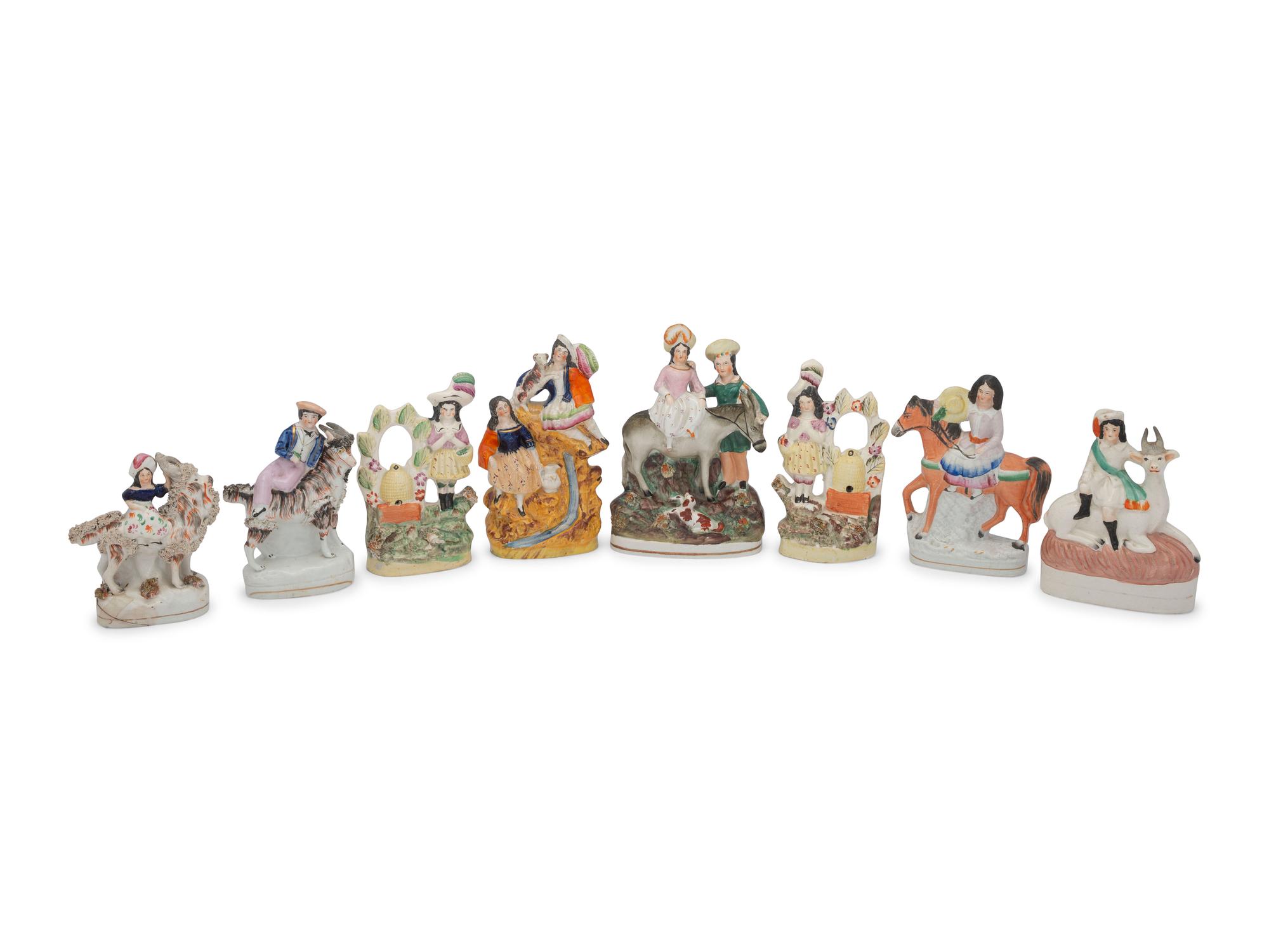 Eight Staffordshire Figures and Figural Groups with Animals