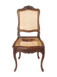 A Pair of Louis XV Carved Walnut Side Chairs