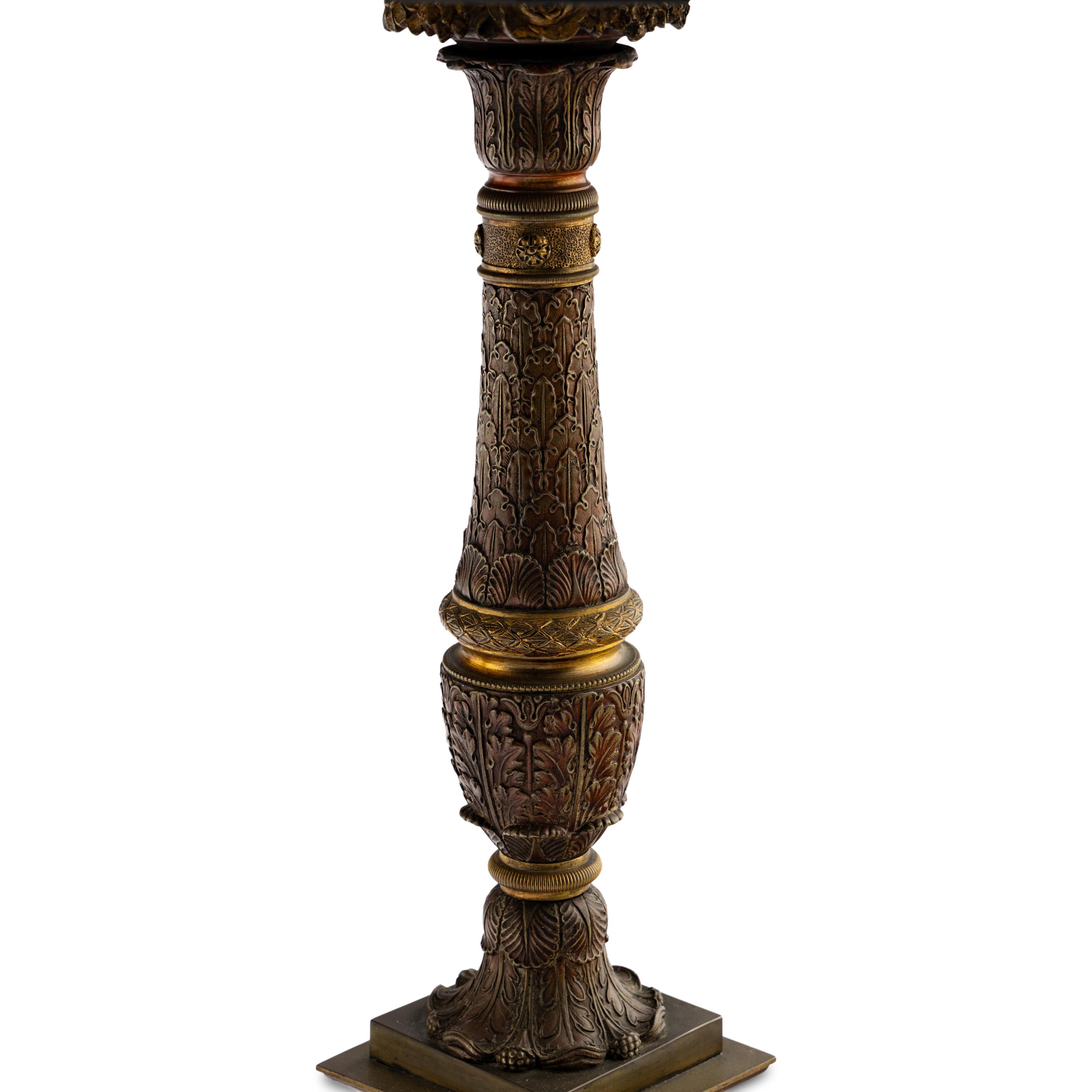 A Pair of French Parcel Gilt Bronze Columnar Lamps