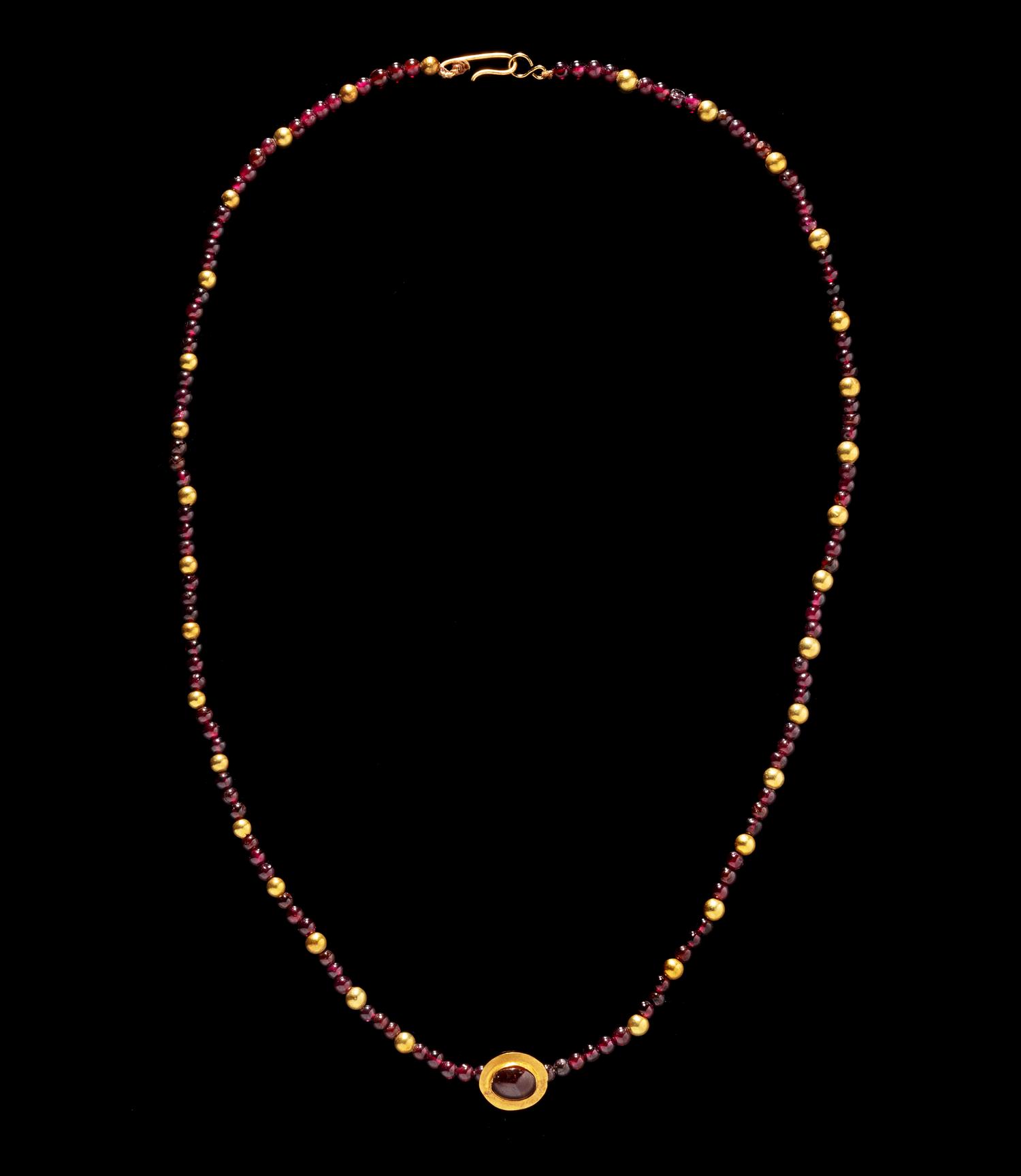 A Roman Gold and Garnet Bead Necklace