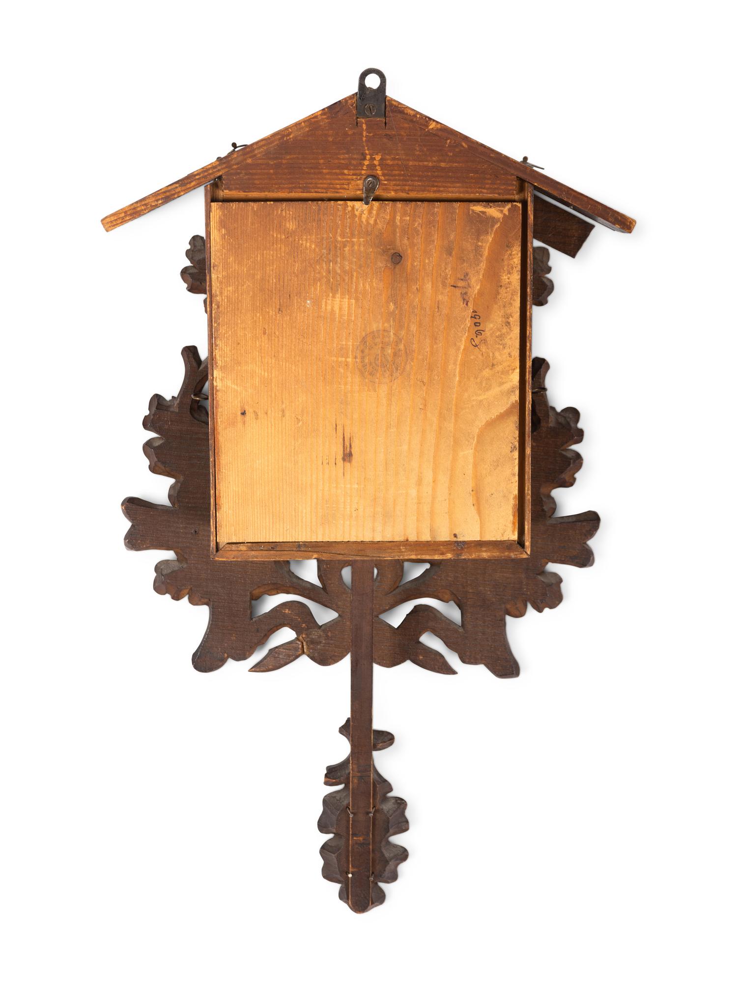 A Black Forest Carved Cuckoo Clock