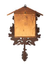 A Black Forest Carved Cuckoo Clock