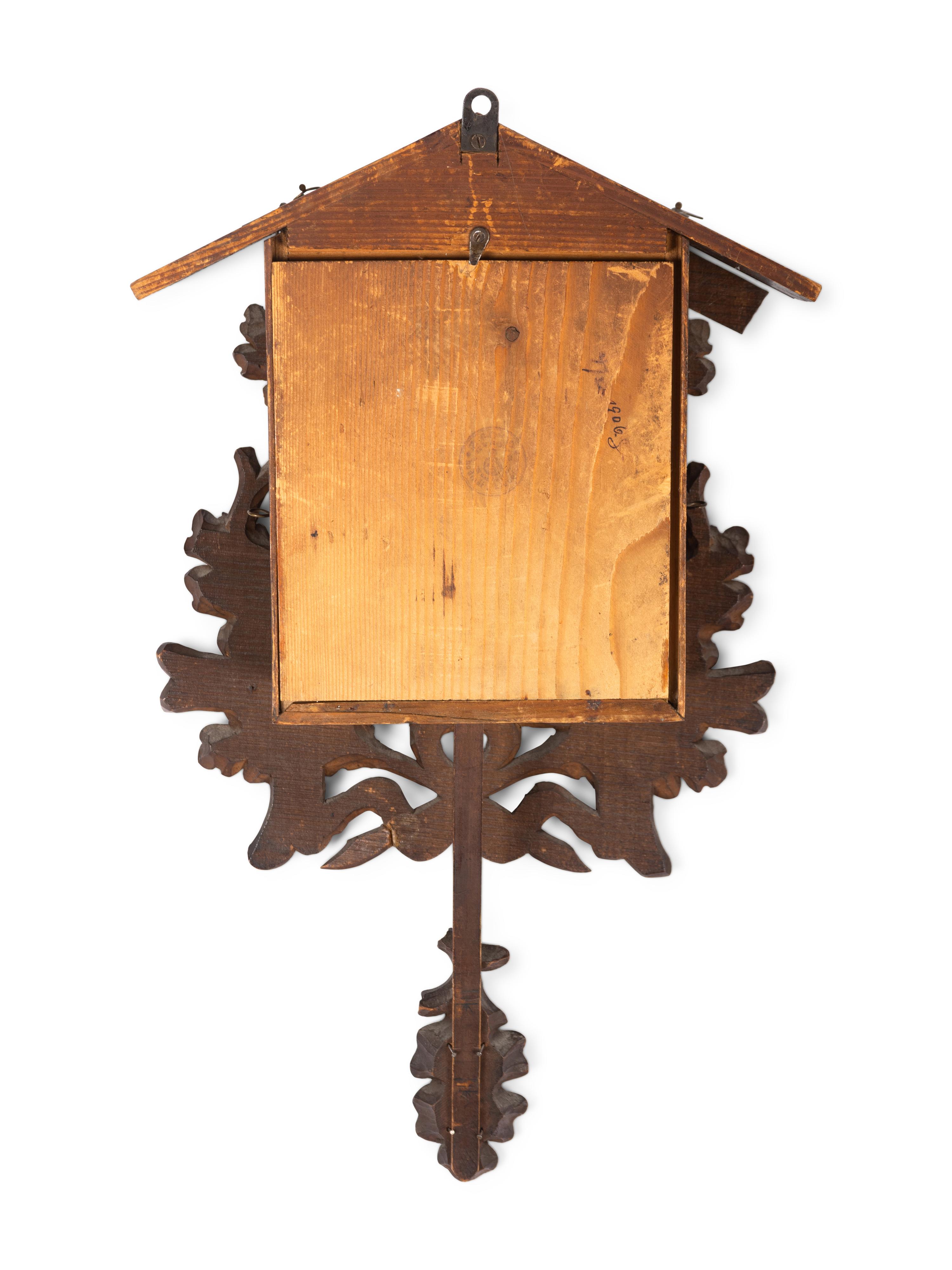 A Black Forest Carved Cuckoo Clock