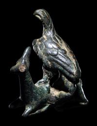 A Roman Bronze Eagle Grasping a Deer