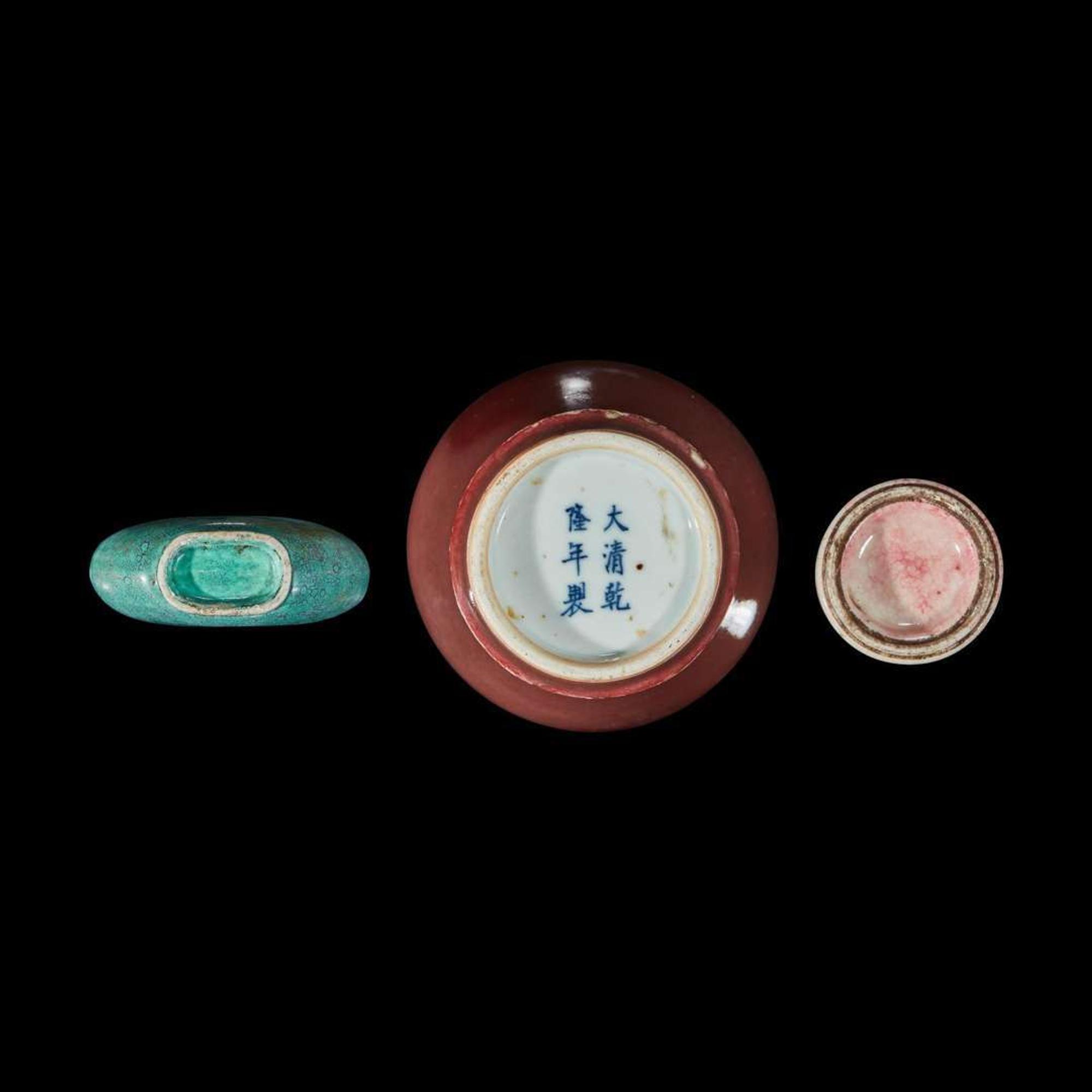 A Chinese red-glazed small meiping and two porcelain snuff bottles