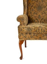 A Queen Anne Style Upholstered Wing Back Armchair — 20th Century