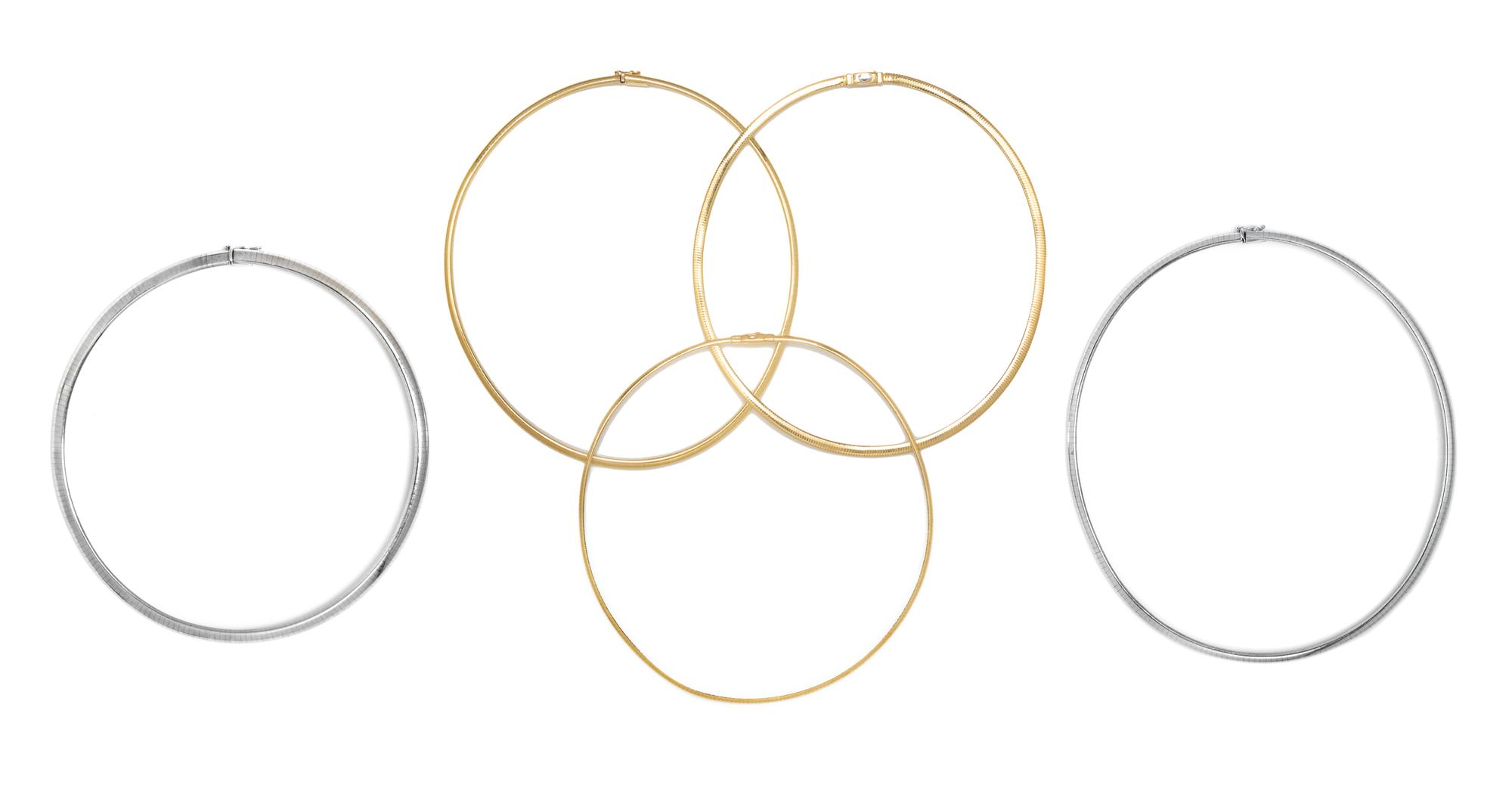 A Collection of Yellow and White Gold Omega Chain Necklaces, 49.90 dwts.