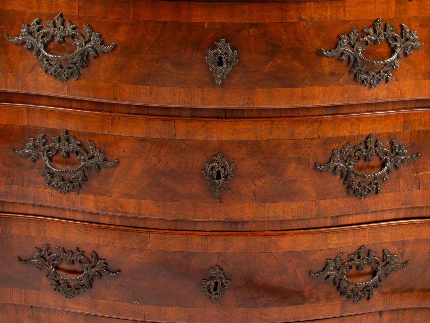 A German Walnut Chest of Drawers