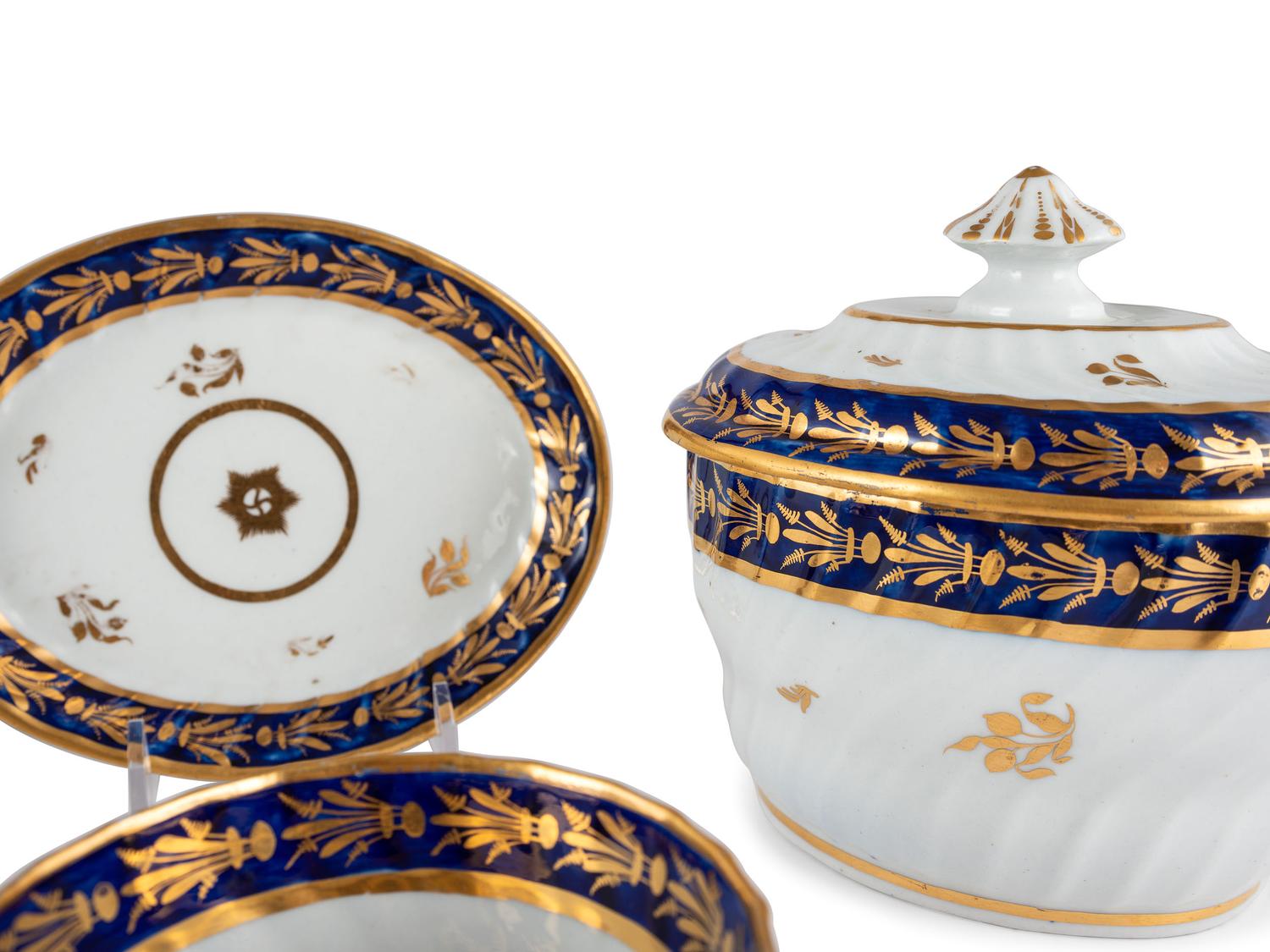 An English Gilt and Cobalt Decorated Porcelain Tea Service