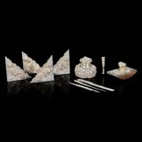 An eight-piece Chinese silver desk set with two added pieces 银质器具一组八件及两附件