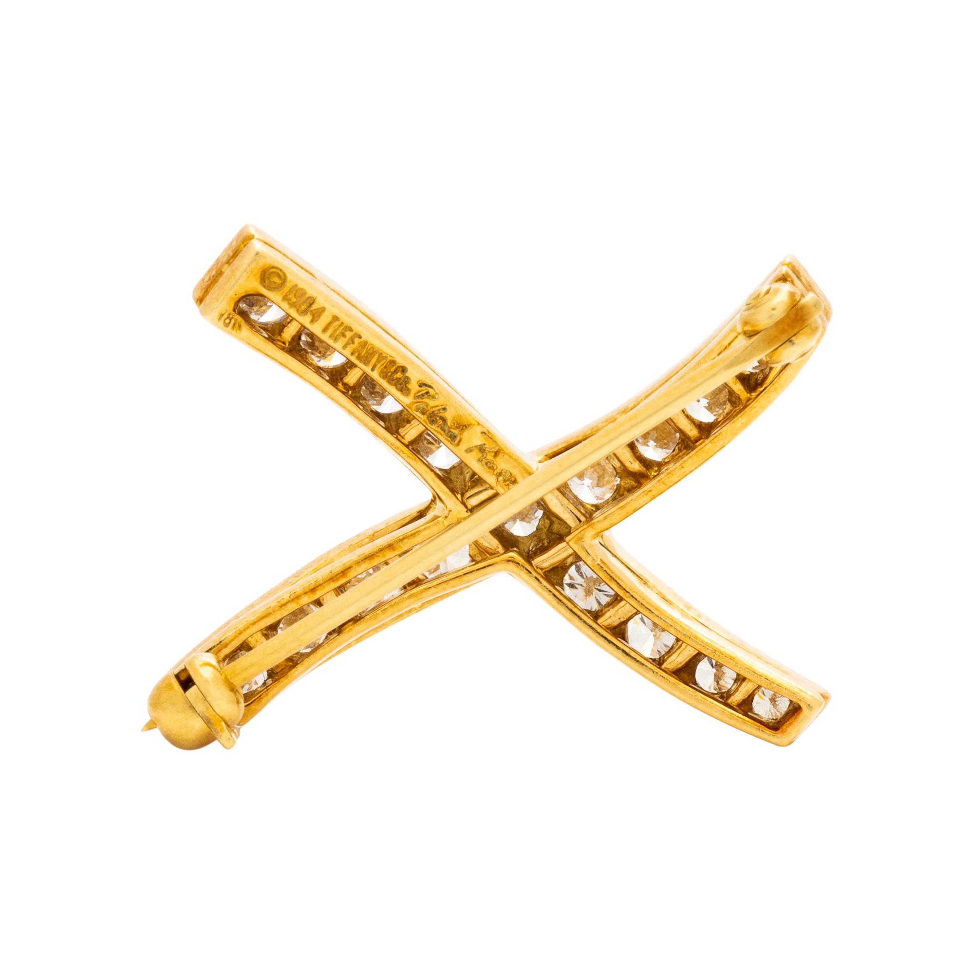 TIFFANY & CO., PALOMA PICASSO, YELLOW GOLD AND DIAMOND 'X KISS' BROOCH