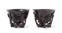 A Pair of Zitan Libation Cups Each height 3 1/8 inches. — 18TH CENTURY