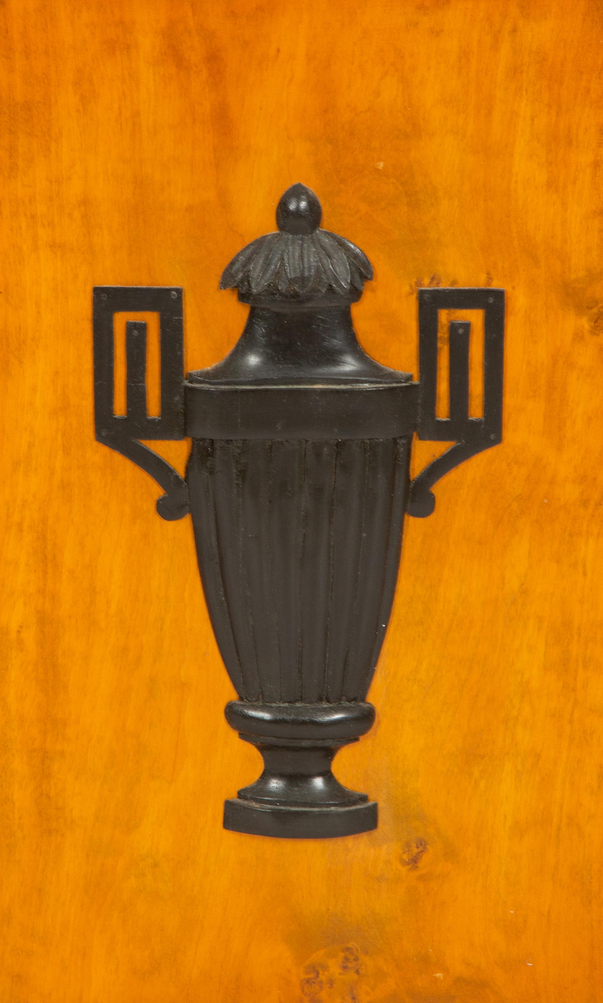 A Neoclassical Style Fruitwood and Parcel Ebonized Console Cabinet