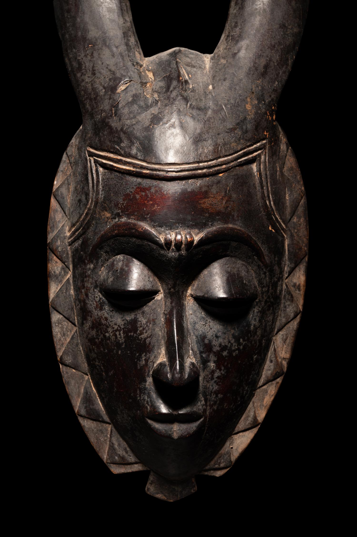 Two Baule Wood Masks