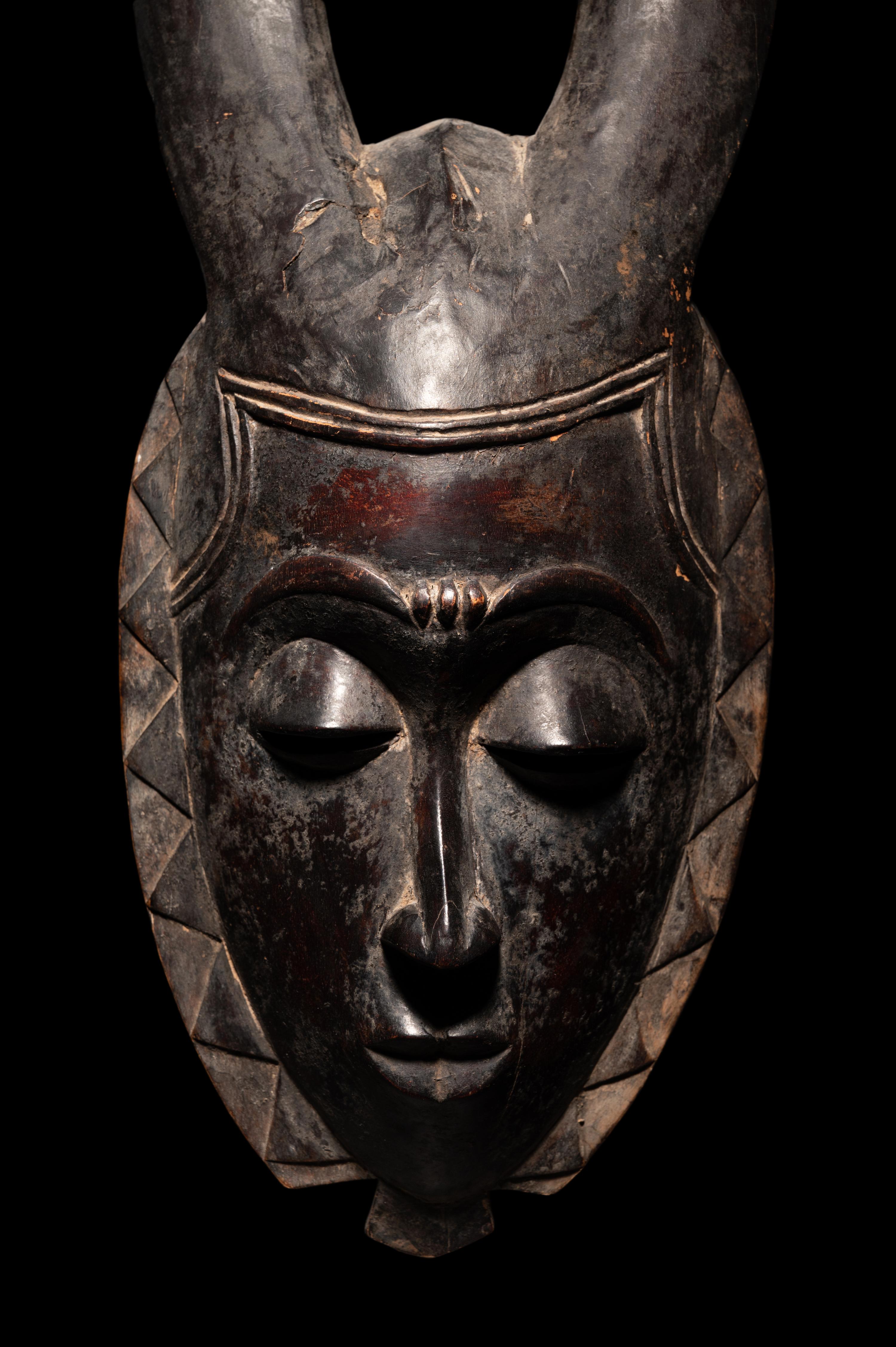 Two Baule Wood Masks