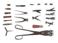 [MILITARIA]. A group of gun-related tools and accessories.