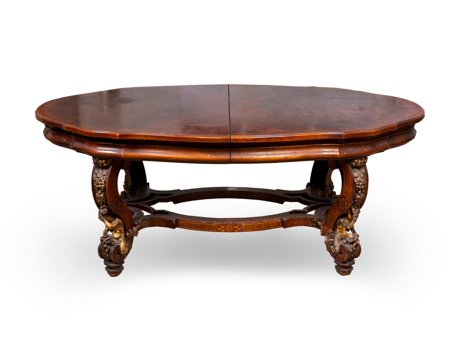 A Rococo Style Carved and Parcel Gilt Walnut Dining Table — 19TH/20TH CENTURY