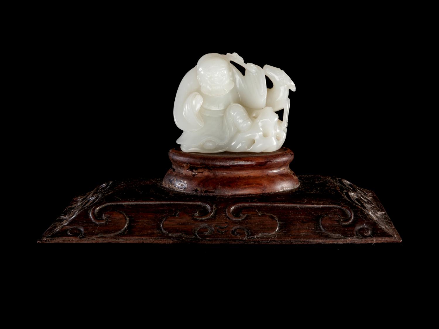A White Jade Figural Group