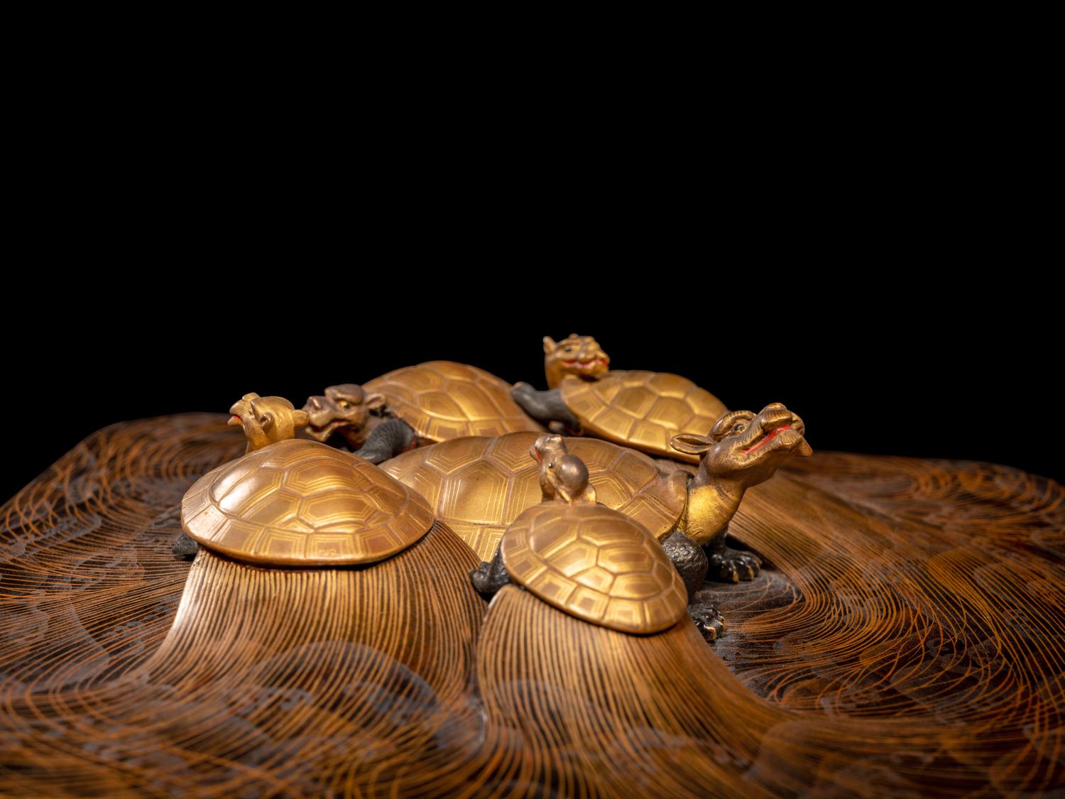A Japanese Gold and Black Lacquer 'Dragon Turtle' Square Stand