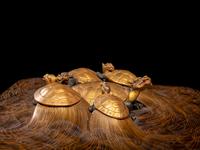 A Japanese Gold and Black Lacquer 'Dragon Turtle' Square Stand