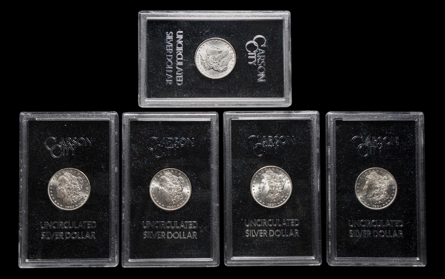 A Group of Five 1880-CC GSA: Morgan $1 Coins