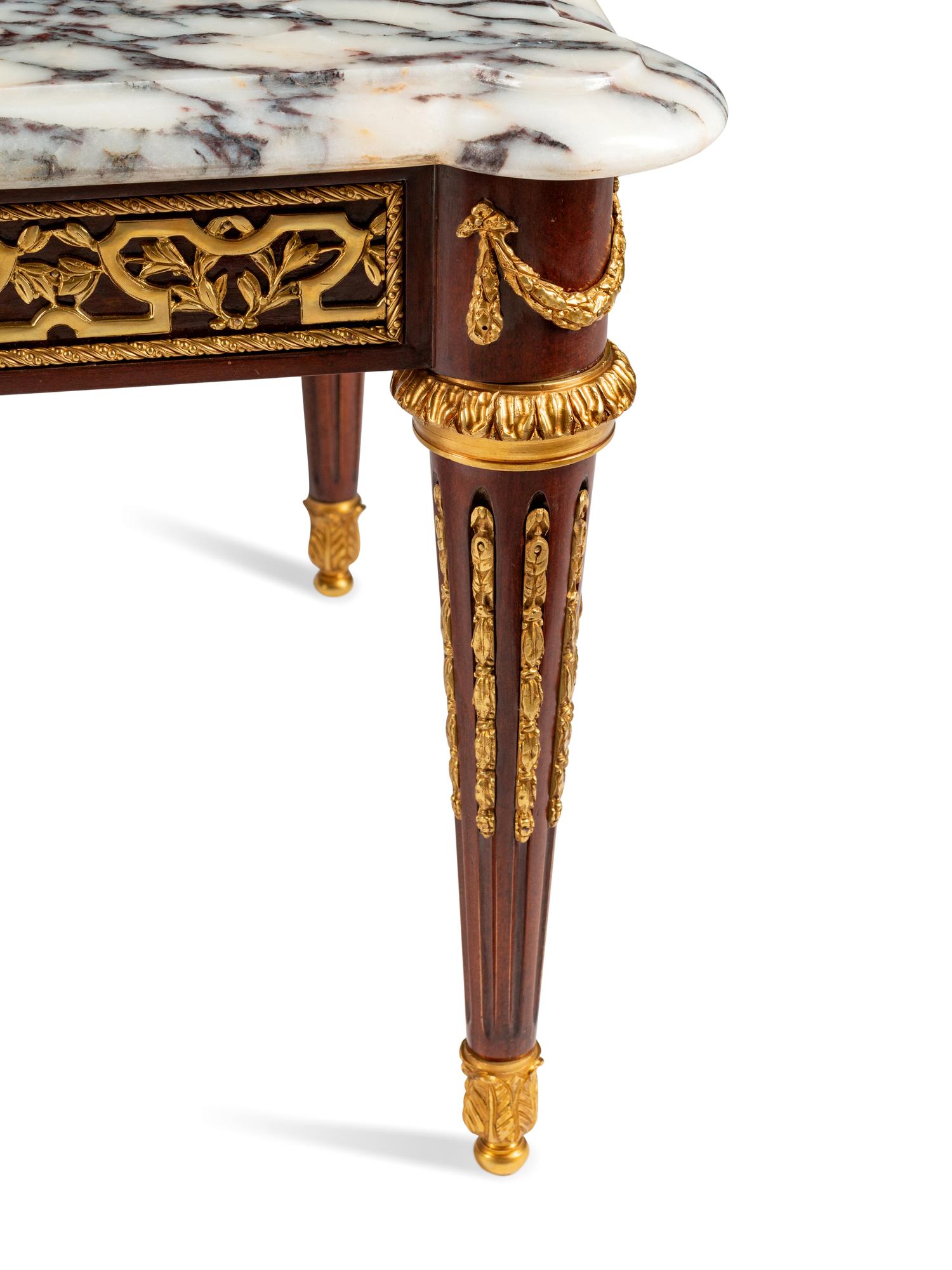 A Louis XVI Style Gilt-Bronze-Mounted Mahogany Low Table