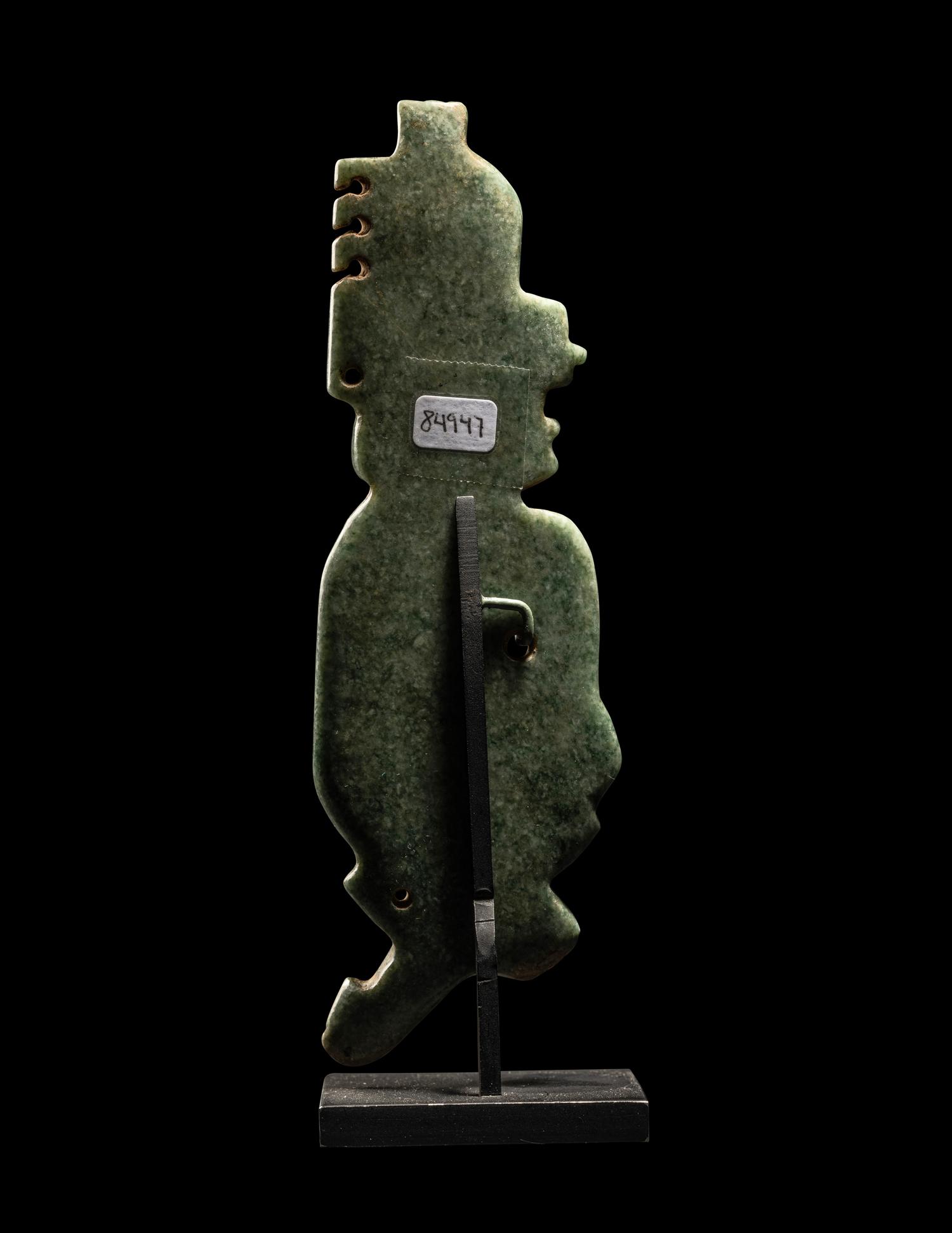An Olmec Jade Transformation Figure with Crossed Legs