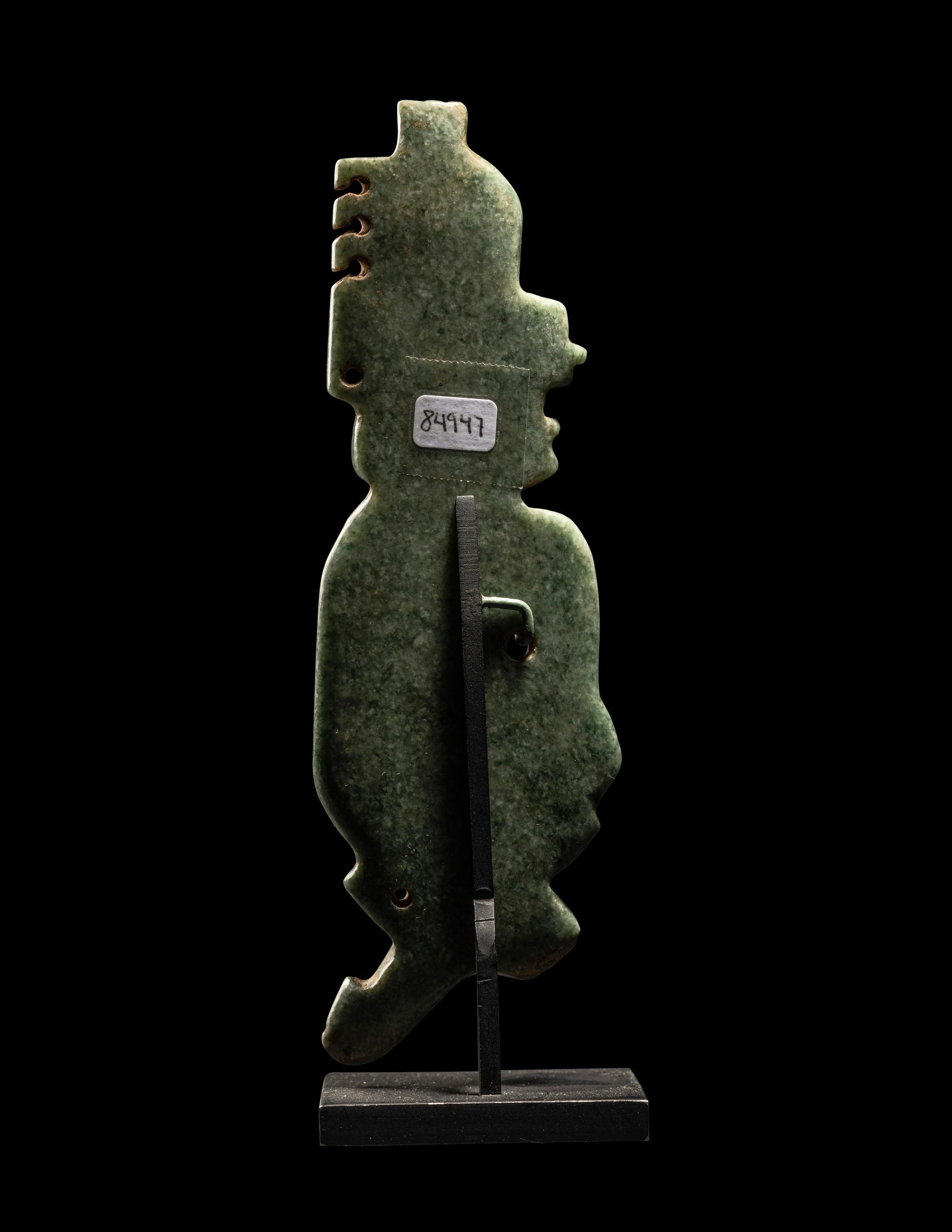 An Olmec Jade Transformation Figure with Crossed Legs