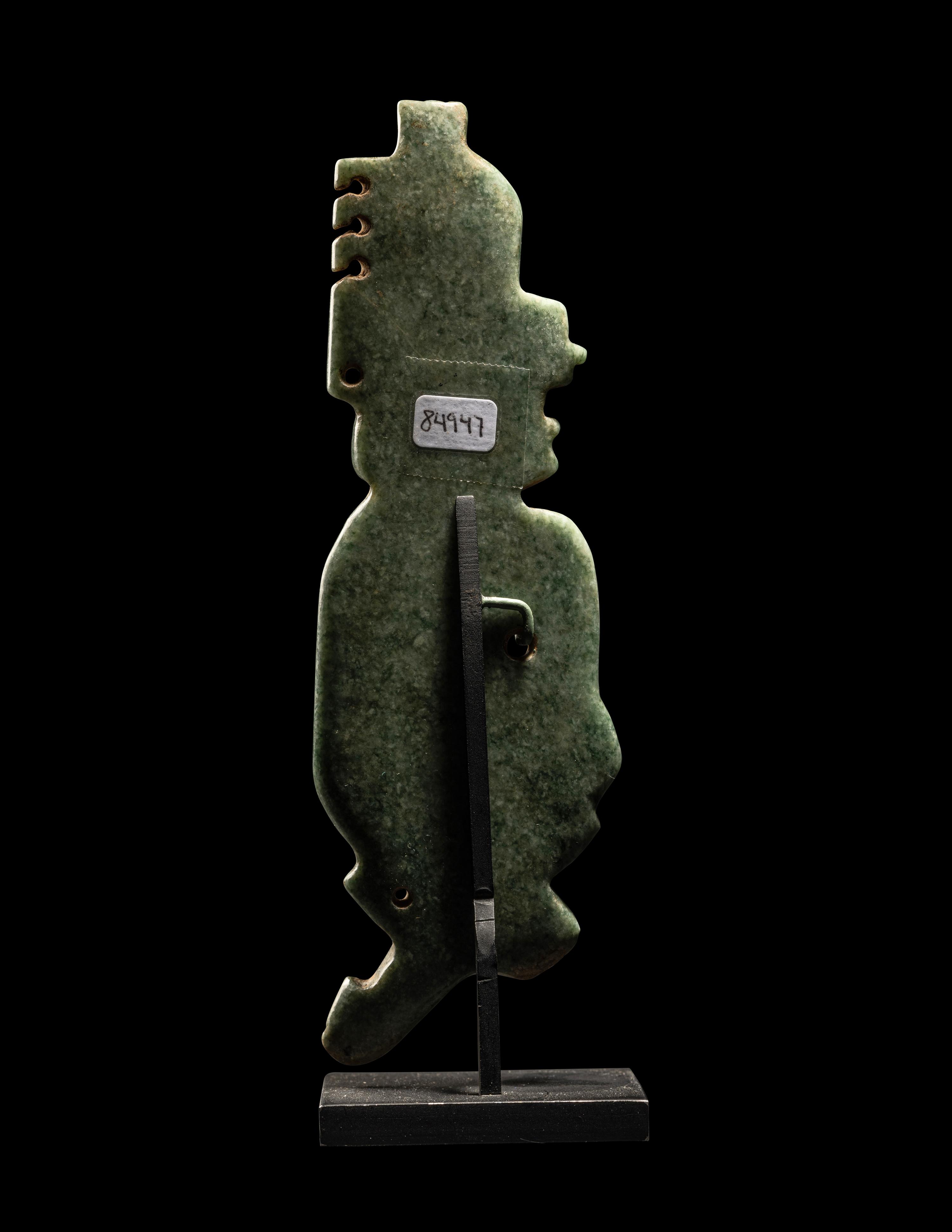 An Olmec Jade Transformation Figure with Crossed Legs