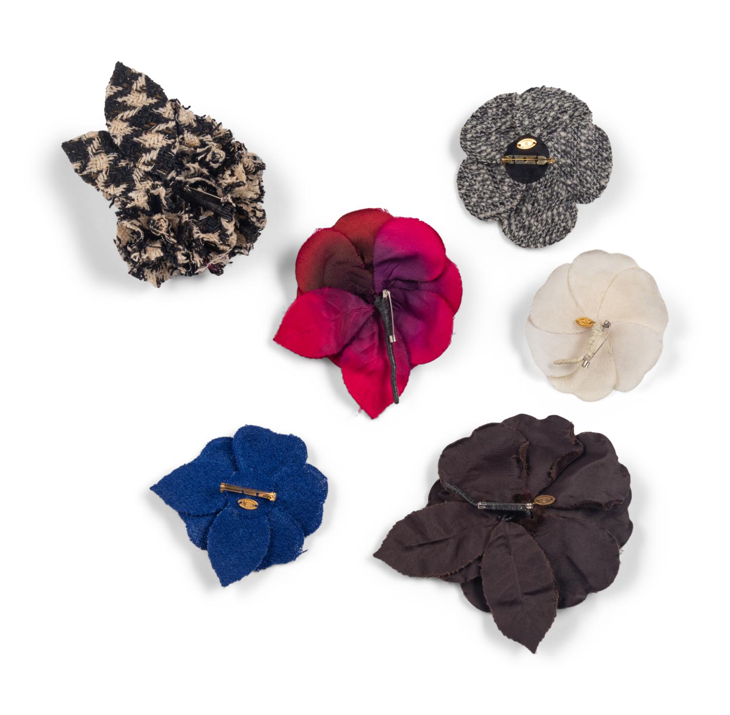 Six Chanel Camellia Brooches