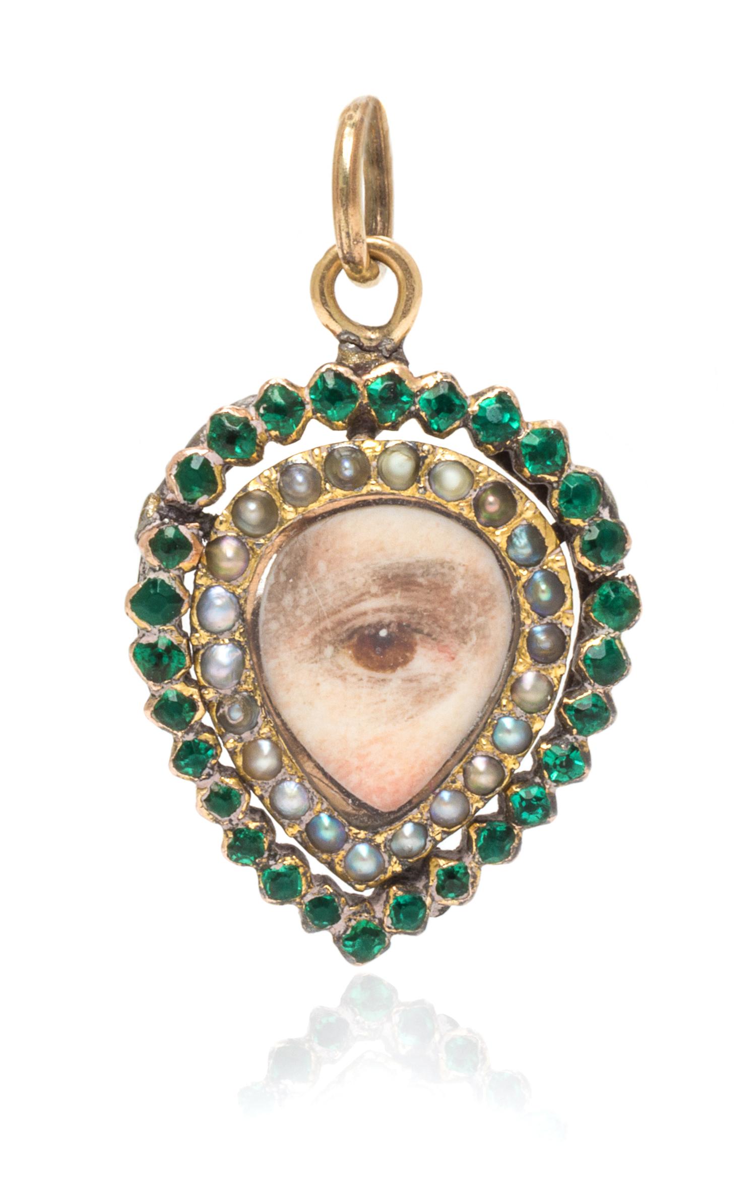 A Georgian Glass and Seed Pearl Lover's Eye Pendant, 1.70 dwts.