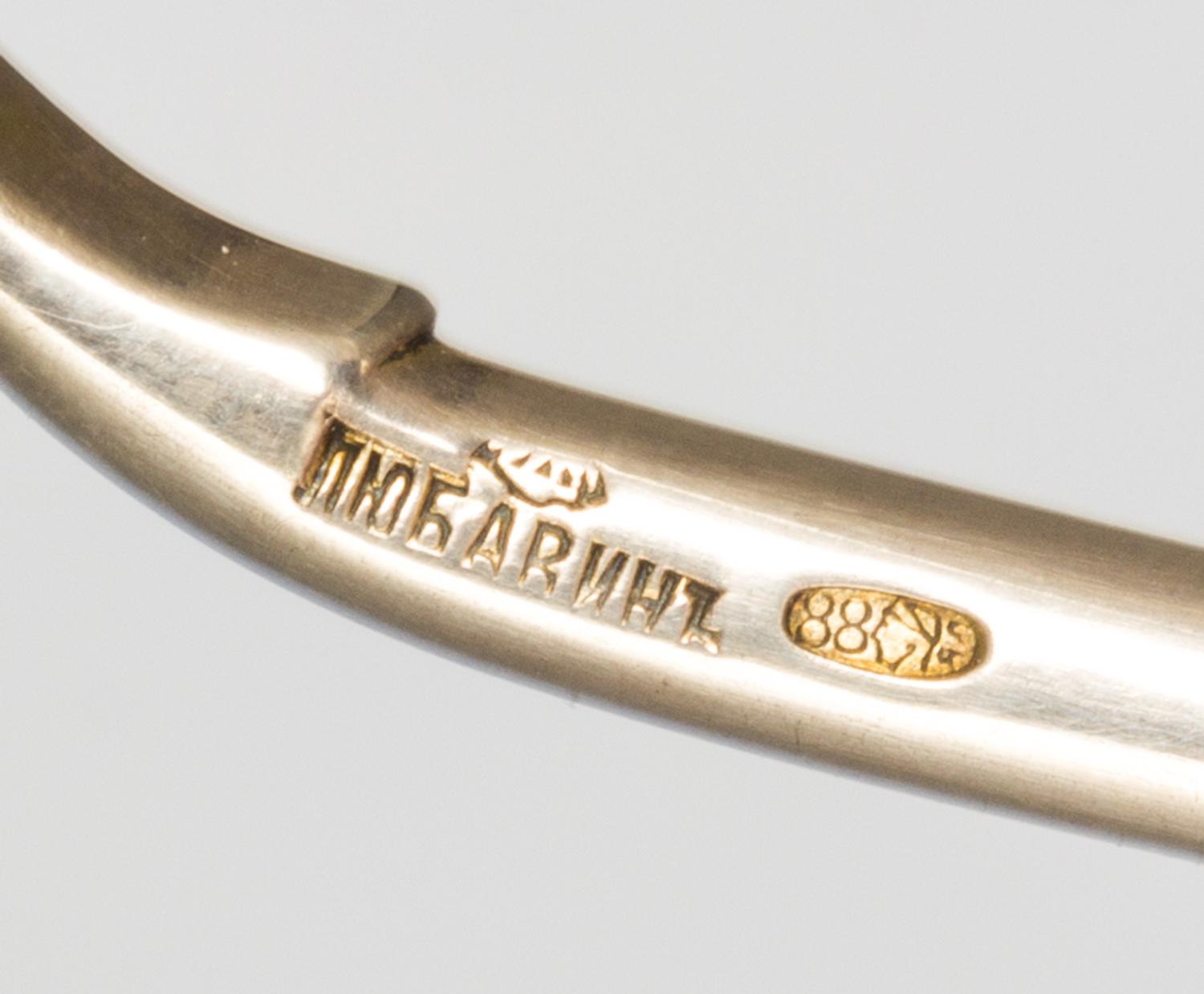A Russian Silver-Gilt and Enamel Spoon, Mark of Alexander Lyubavin, kokoshnik mark of Yakov Lyapunov, St. Petersburg, late 19th/early 2