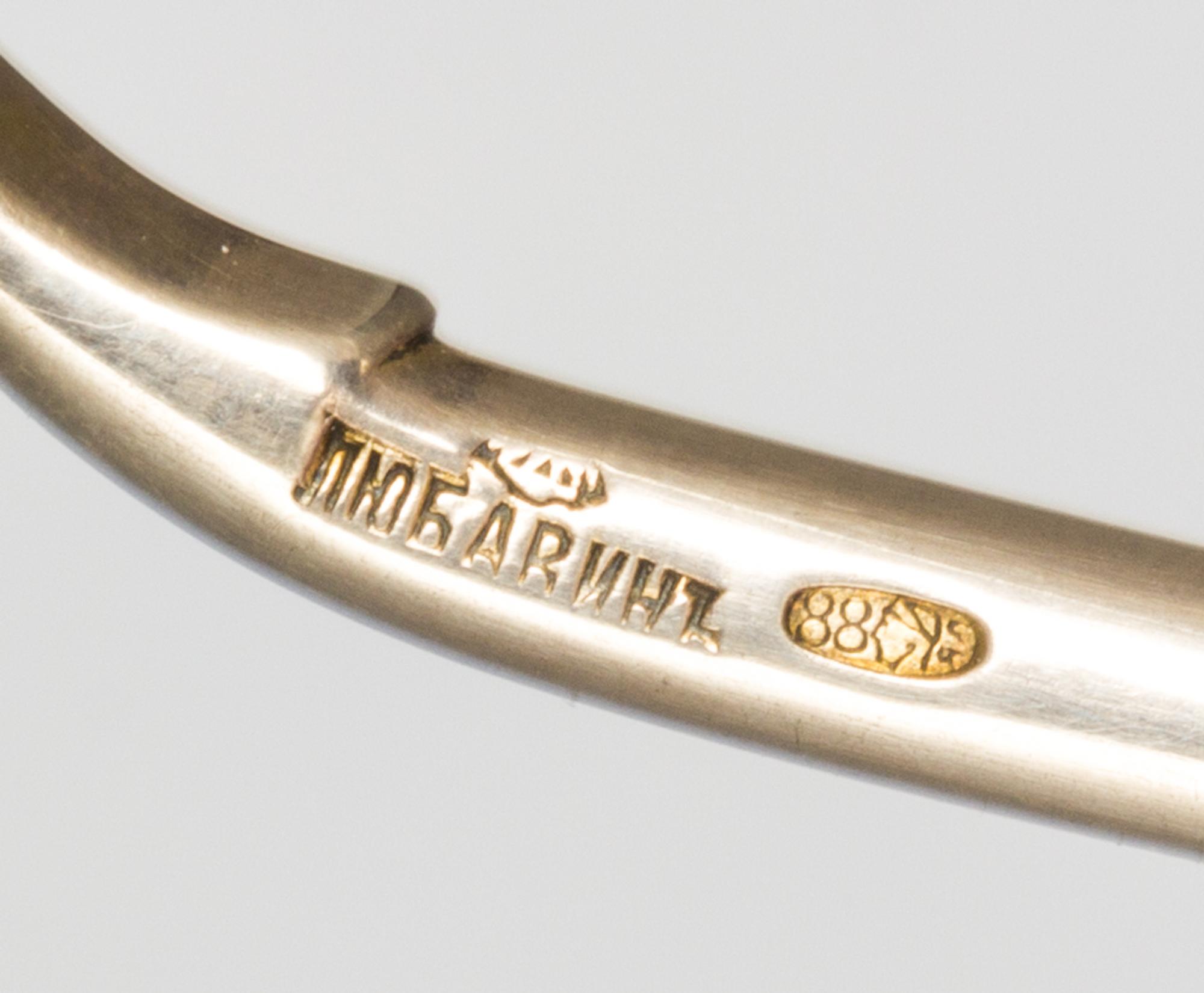A Russian Silver-Gilt and Enamel Spoon, Mark of Alexander Lyubavin, kokoshnik mark of Yakov Lyapunov, St. Petersburg, late 19th/early 2