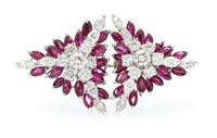 An 18 Karat White Gold Diamond and Ruby Brooch, 8.80 dwts.
