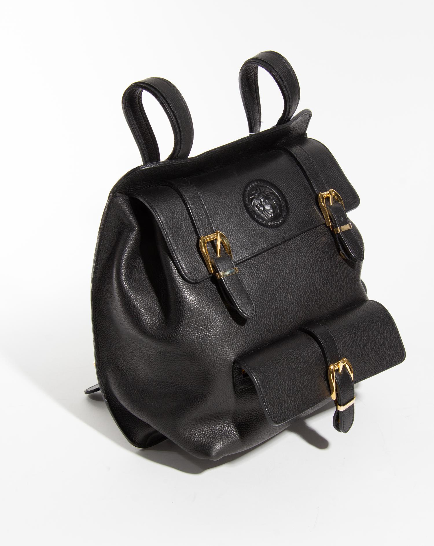 A Gianni Versace Black Leather Backpack, 11.75" x 11" x 4.5".