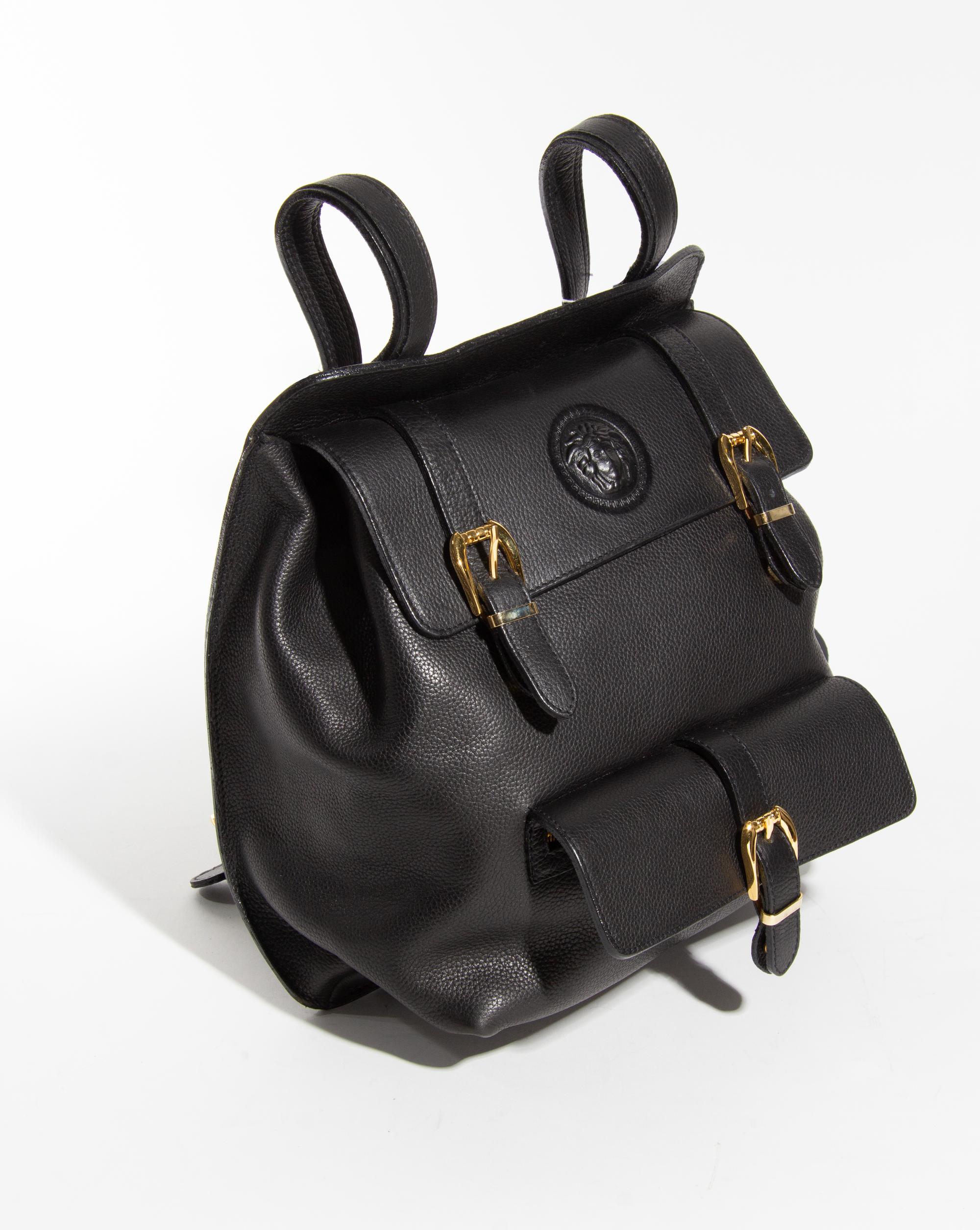 A Gianni Versace Black Leather Backpack, 11.75" x 11" x 4.5".