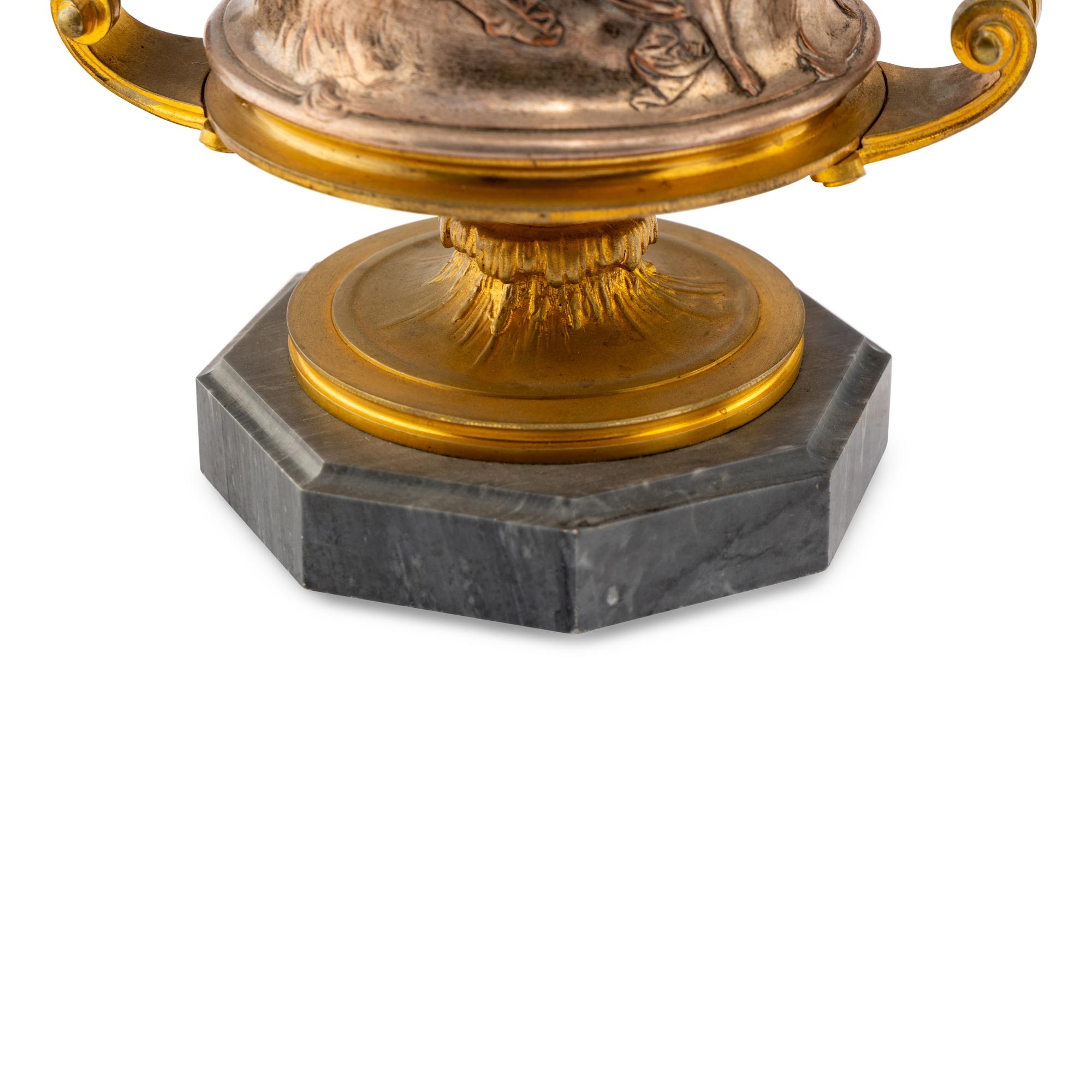 A Pair of French Gilt and Silvered Bronze Urns