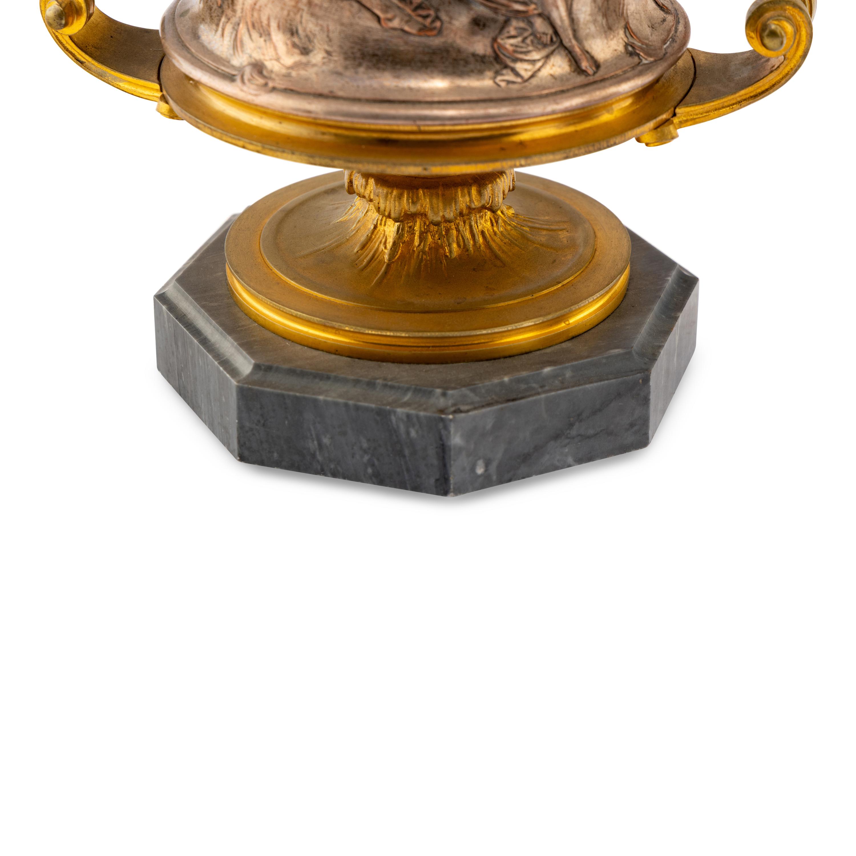 A Pair of French Gilt and Silvered Bronze Urns