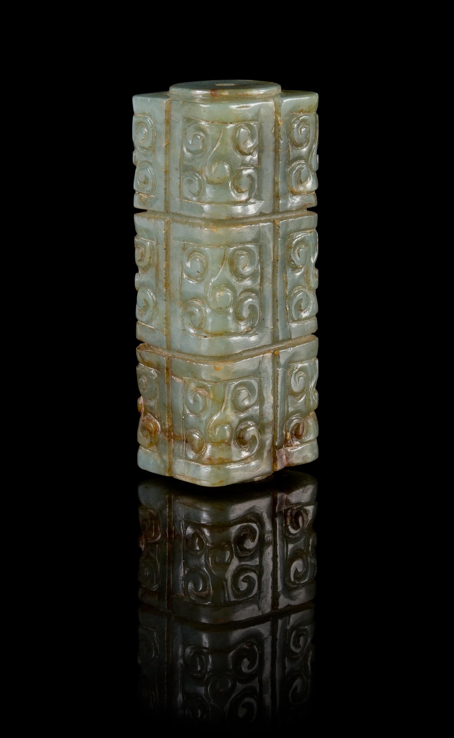 A Celadon Jade Cong-Form Pendant Length 2 1/2 inches.