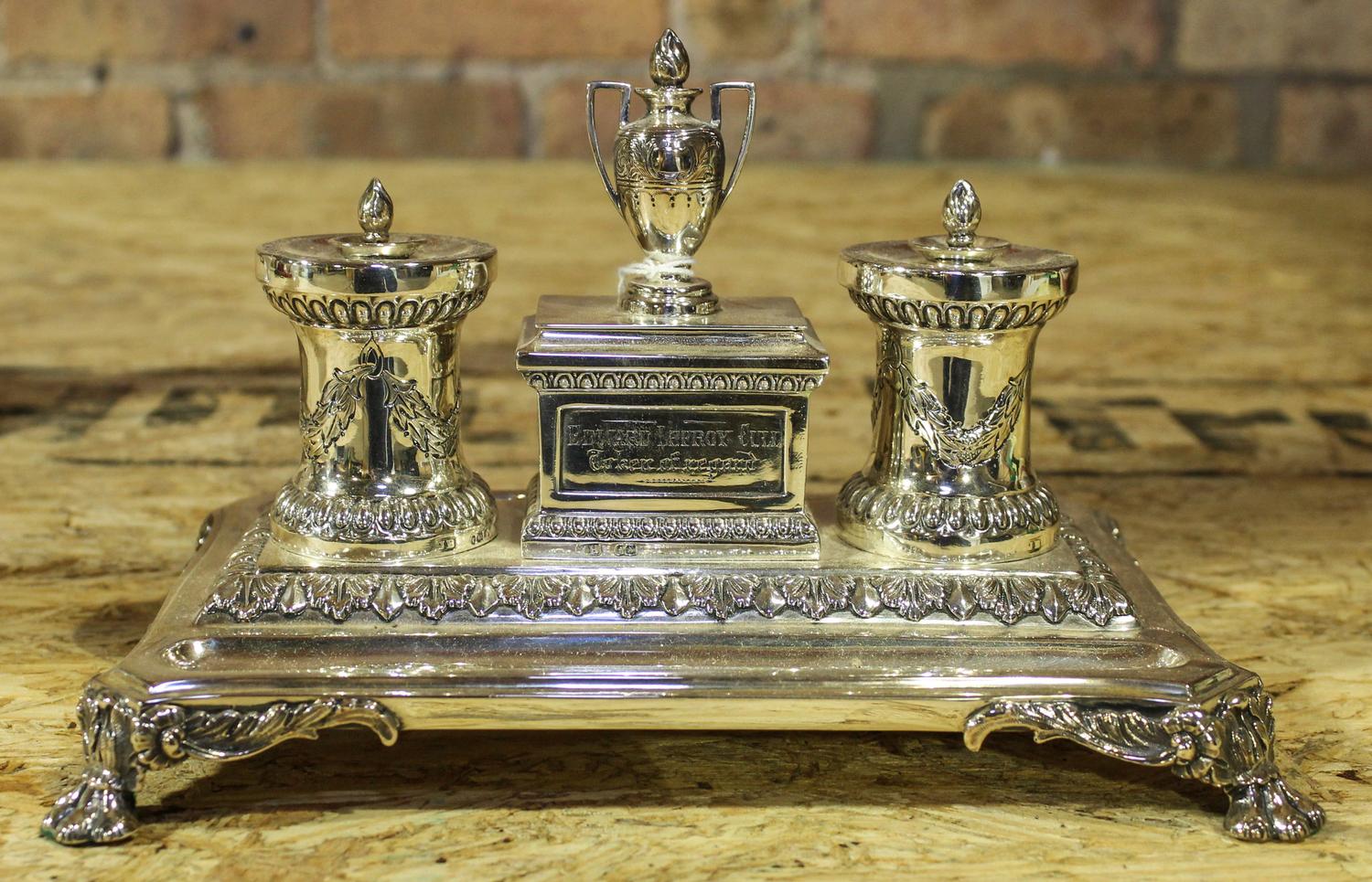 A Silver Victorian Inkwell. Length 8 inches.