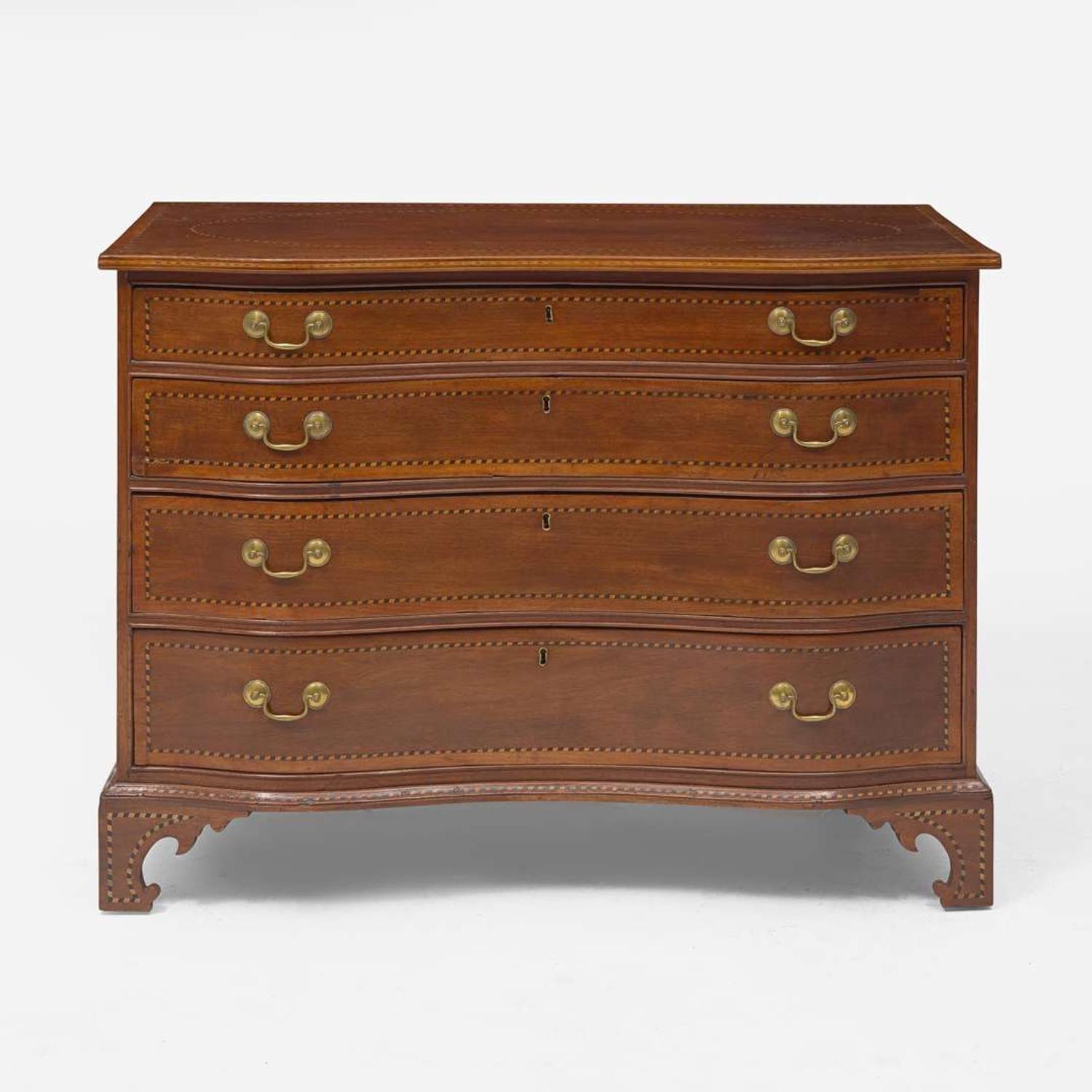 A Federal reverse serpentine inlaid cherry chest of drawers New England, circa 1810