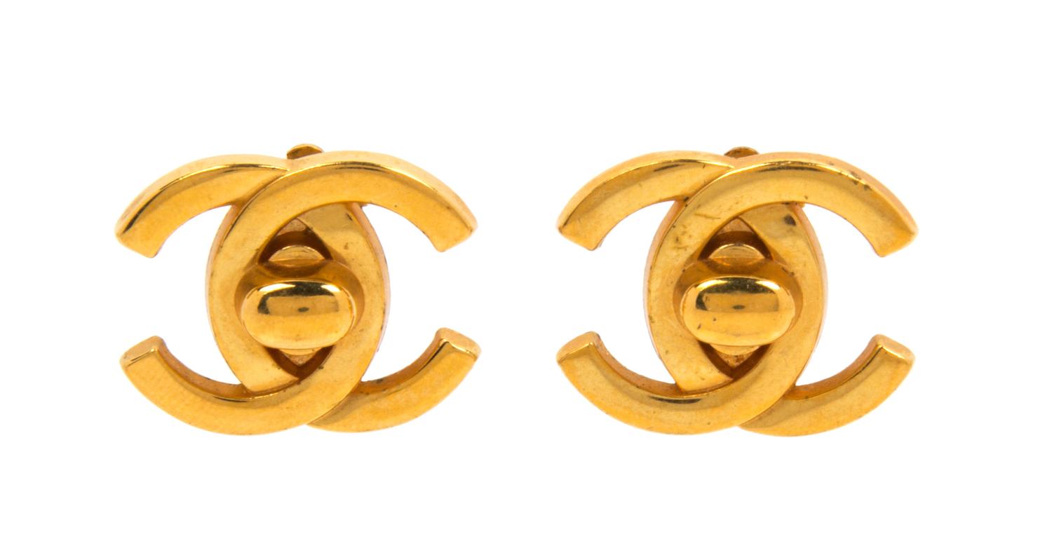 A Pair of Chanel Goldtone Logo Earclips, 1".