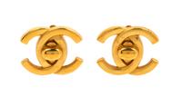 A Pair of Chanel Goldtone Logo Earclips, 1".