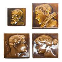 A Collection of Seven Pottery Tiles Average height 6 1/2 inches.