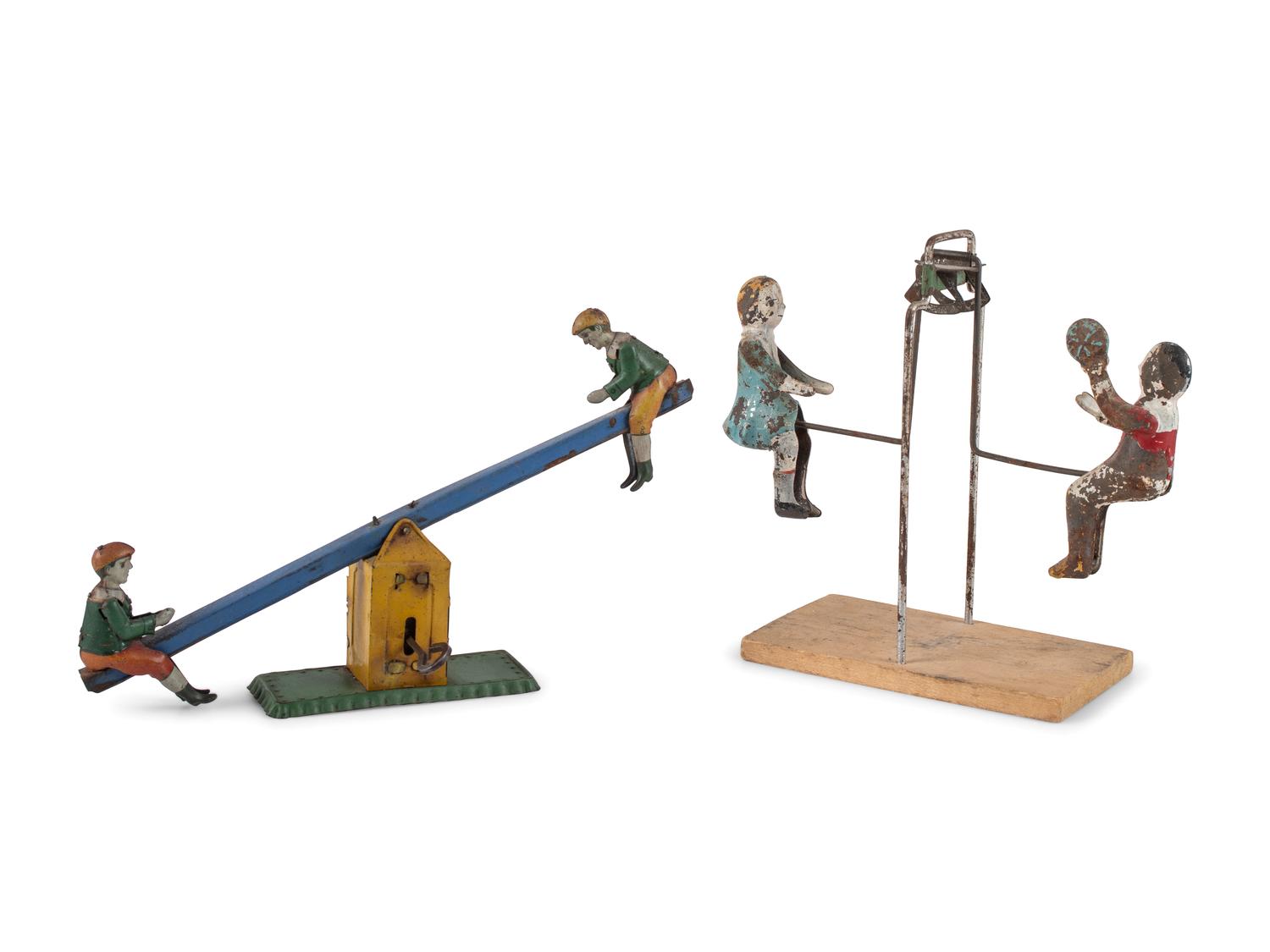 A Group of Tin and Composite Toys