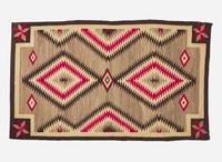 A Navajo woven "Eye Dazzler" rug, 20th century