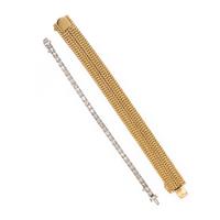 PLATINUM AND DIAMOND LINE BRACELET WITH A YELLOW GOLD JACKET