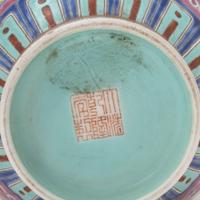A Chinese Ruby Ground Famille Rose Porcelain Vase